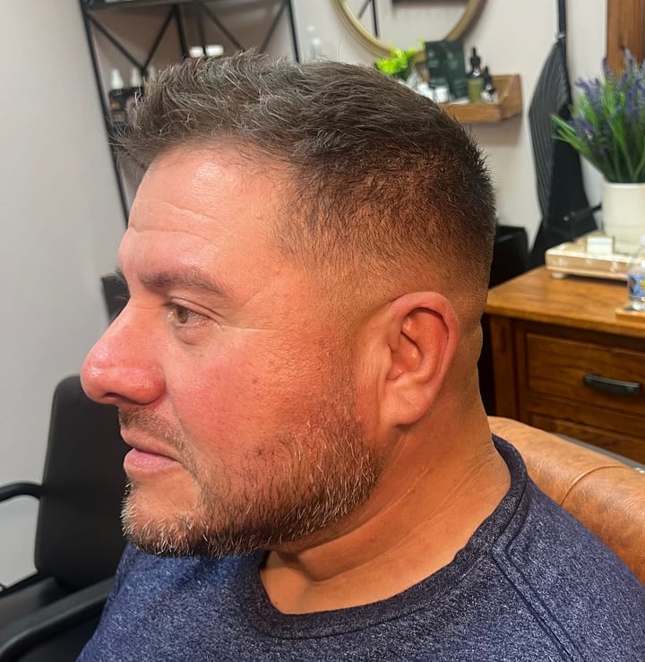 A skin fade cut by Sara Jane, side profile