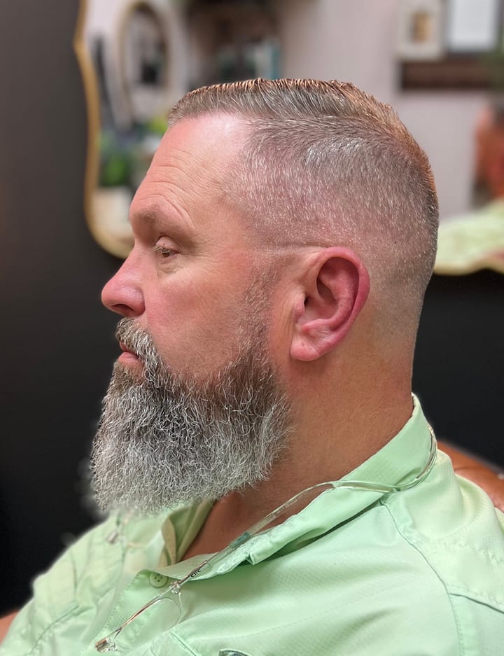 A big beard lined up by Sara Jane, side profile